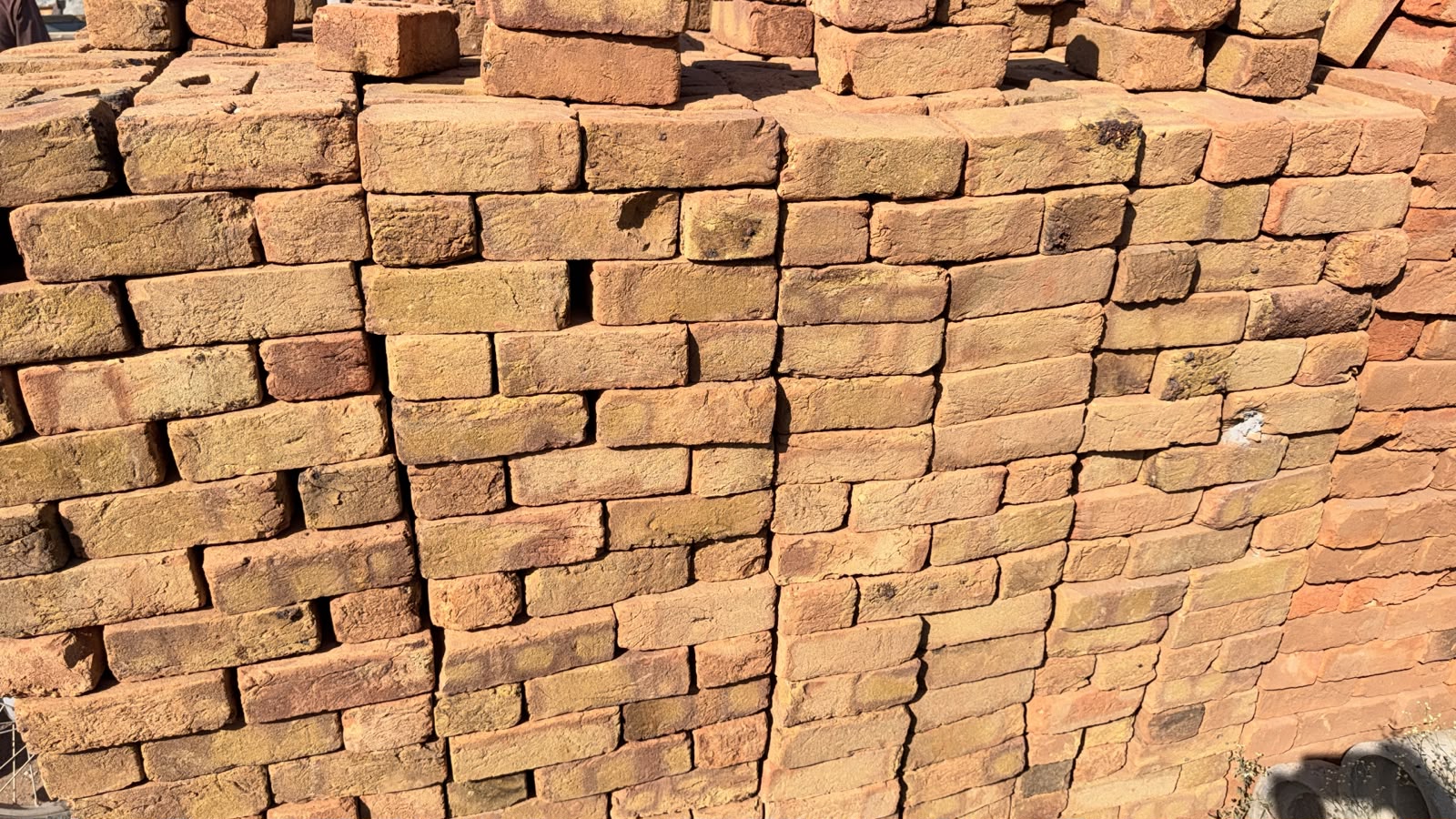 Stacked clay bricks for construction