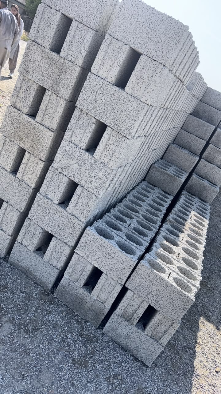Stacked hollow concrete masonry blocks
