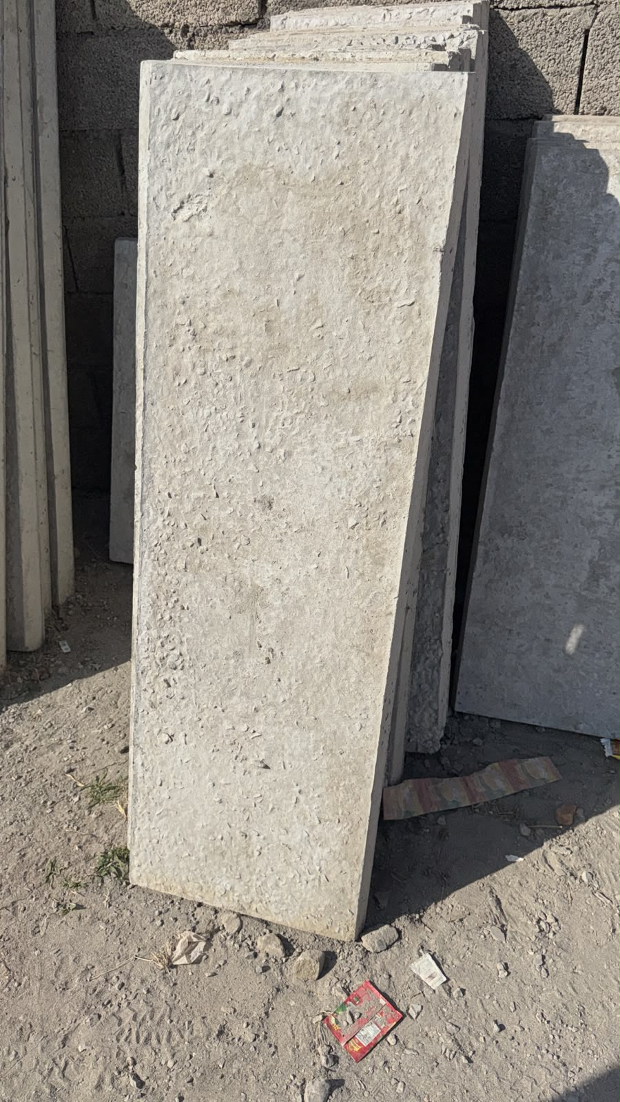 Precast concrete slabs stacked upright